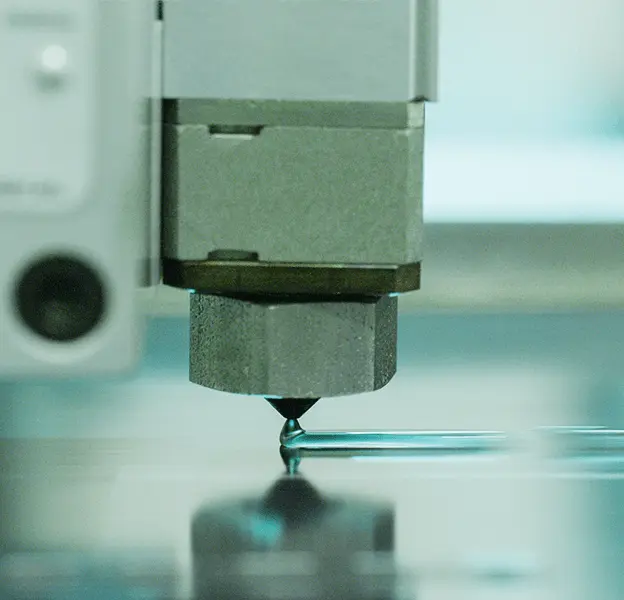 Applicator dispensing adhesive